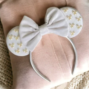 Tiara Minnie orelha laço parques Disney - branca com detalhe em mickey em pérolas